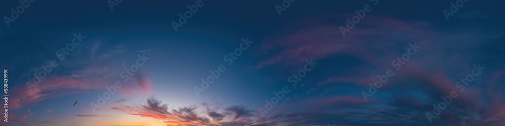 Blue evening sky seamless panorama spherical equirectangular 360 degree view with Cumulus clouds, setting sun. Full zenith for use in 3D graphics, game and aerial drone panoramas as sky replacement.