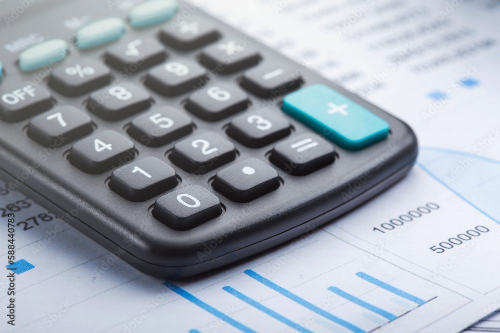 calculator and accounting document. Concept of banking, financial report and financial audit. calculator and accounting document. Concept of banking, financial report and financial audit.