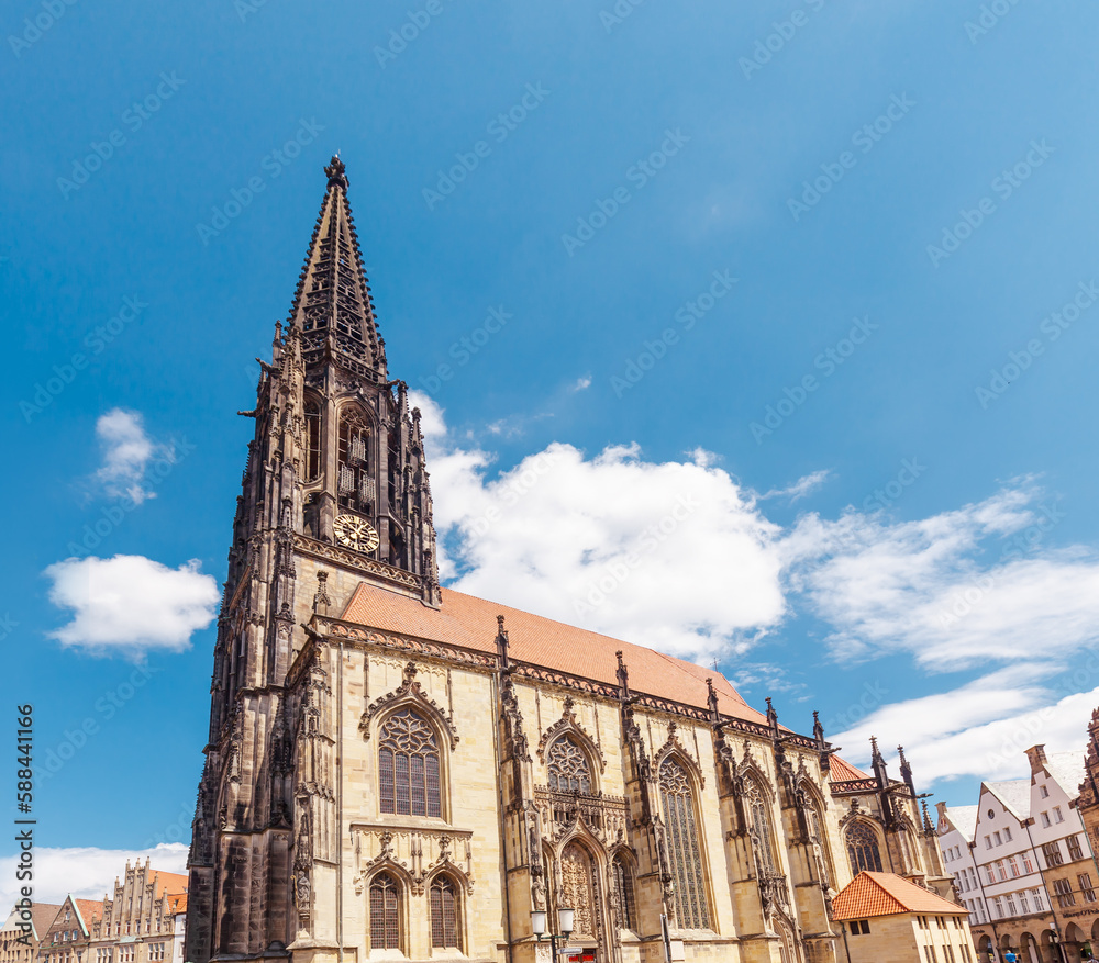 Fototapeta premium St. Lamberti - Roman Catholic church from below. St. Lamberti in Muenster. Town in North Rhine Westphalia, Germany, Europe