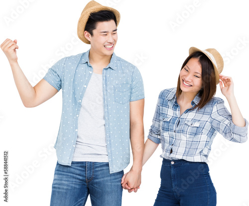 Cheerful man gesturing while holding woman hand