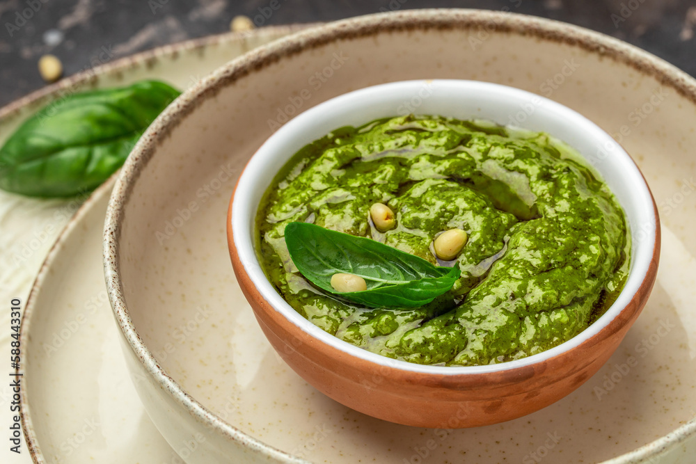 Pesto sauce cooking Basil, olive oil, parmesan, garlic, pine nuts. banner, menu, recipe place for text, top view Pesto sauce cooking Basil, olive oil, parmesan, garlic, pine nuts. banner, menu, recipe place for text, top view