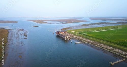 Wallpaper Mural A wooden fishermen's house in the middle of the lagoon Torontodigital.ca