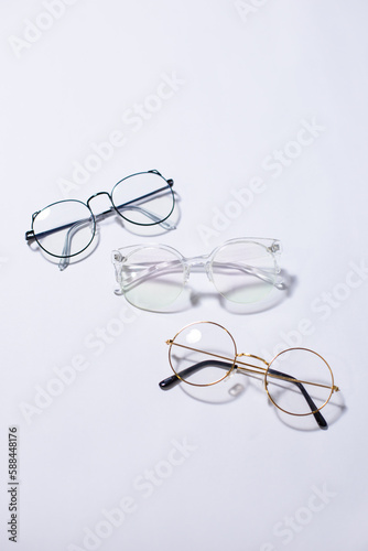 Different glasses on a beautiful light background