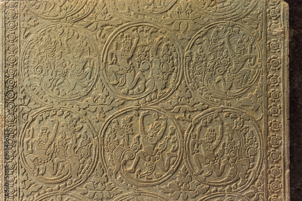 Ancient Khmer bas relief carving at Angkor Wat Temple, Cambodia