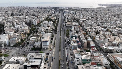 Aerial drone video of landmark buildings in Syggrou Avenue urban cityscape, Athens centre, Attica, Greece photo