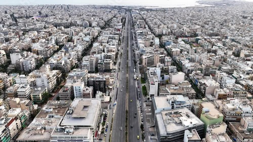 Aerial drone time-lapse video of famous avenue of Syggrou and urban cityscape leading to Athens riviera, Attica, Greece photo