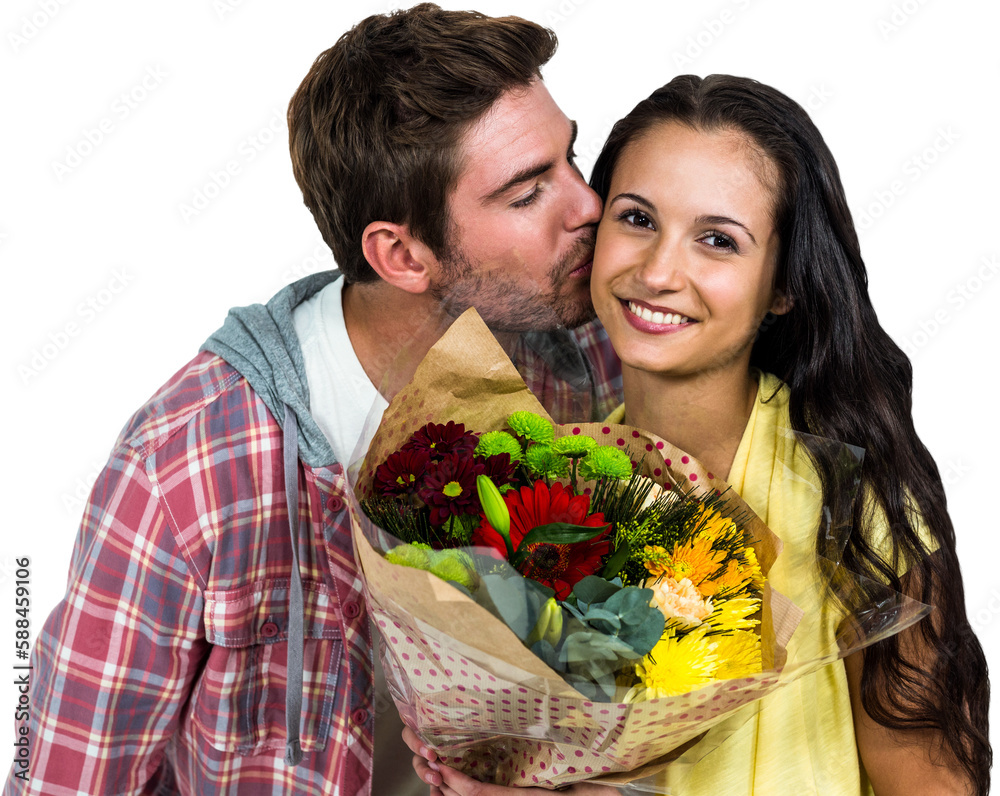 Smiling woman holding bouquet and being kissed by boyfriend