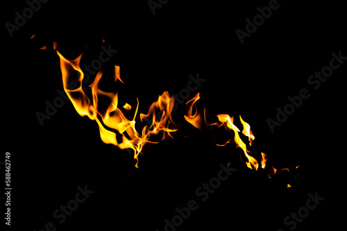 Fire flame texture. Burning material backdrop. Burn effect pattern. Blaze and torch wallpaper. Heat and haze backdrop.