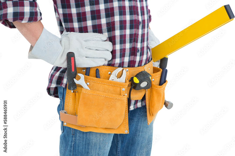 Repairman wearing tool belt while standing with hands on hips Repairman wearing tool belt while standing with hands on hips