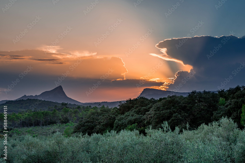 Sunset over the Pic Saint-Loup and the Hortus cliff near Montpellier in the south of France Sunset over the Pic Saint-Loup and the Hortus cliff near Montpellier in the south of France