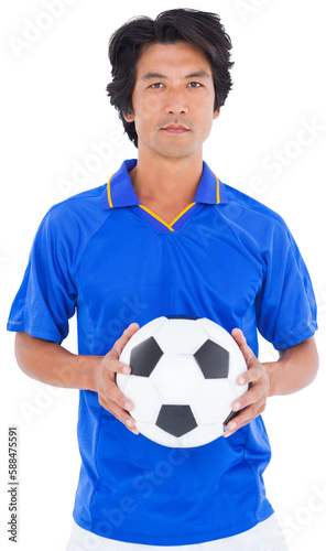 Portrait of player holding football