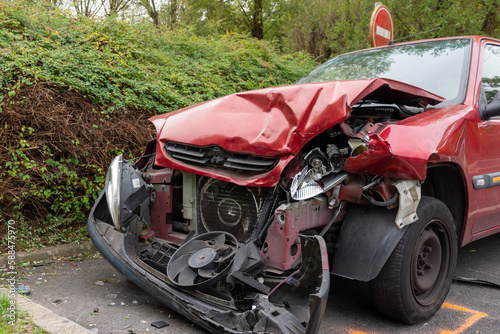 Red broken car after an accident