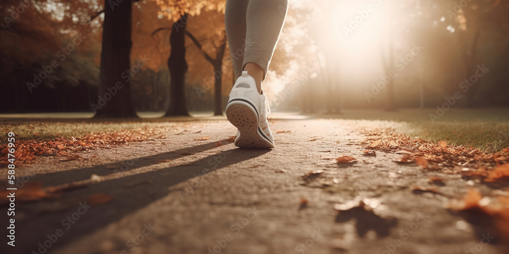 Closeup woman running in the park outdoor. walk and outdoor exercise ...