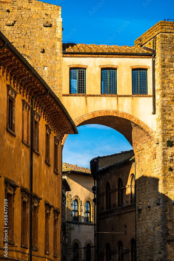 historic buildings at the old town of Volterra in italy