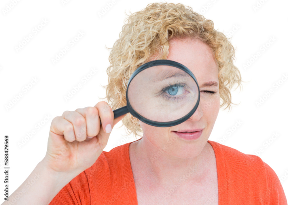 Pretty blonde looking at magnifying glass Pretty blonde looking at magnifying glass