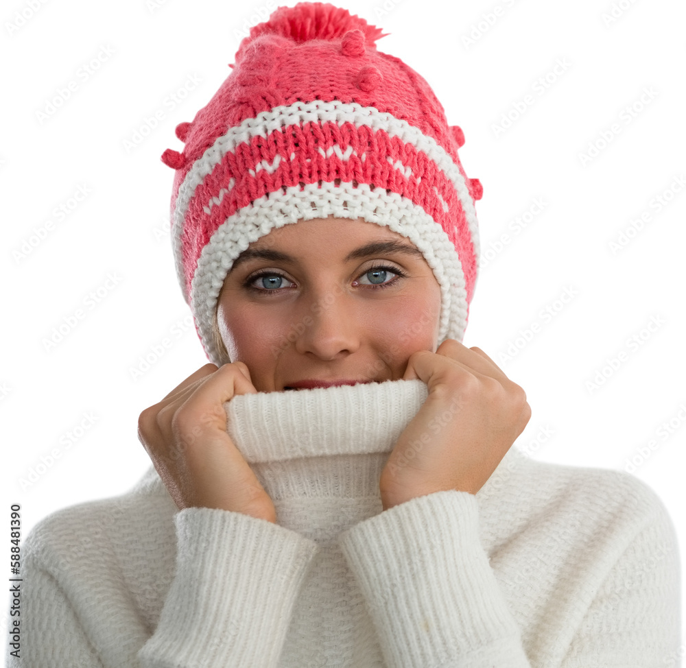 Obraz premium Portrait of woman covering face with turtleneck sweater