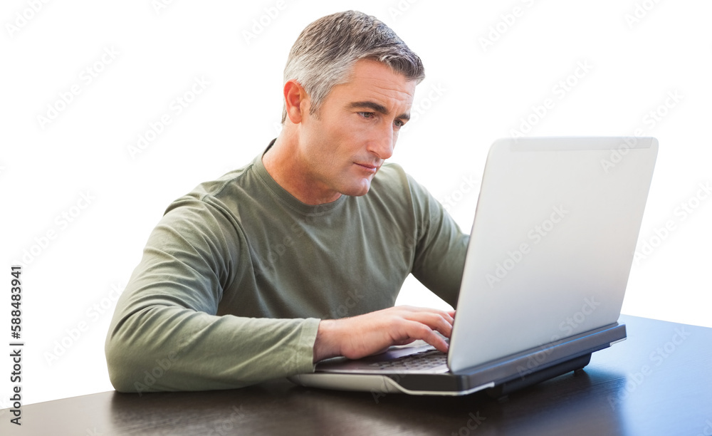 Man using laptop on desk Man using laptop on desk
