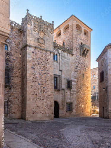 View of the square named Plaza de los Golfines in this roman village namely the Old Town Area in Cáceres, Spain. photo