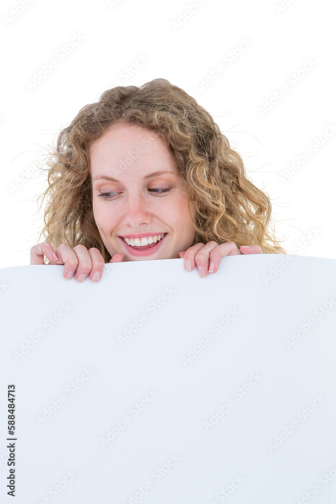 Hipster woman showing poster smiling at camera Hipster woman showing poster smiling at camera
