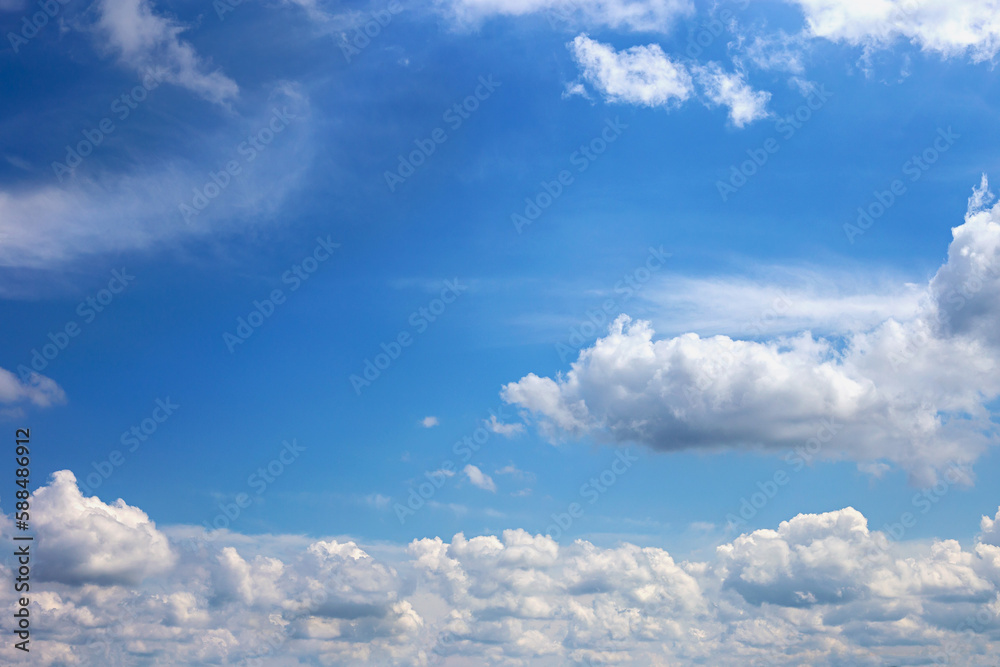 Fototapeta premium Beautiful blue sky with white clouds as a natural background.