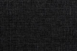 Carbon fiber background. Texture of black fabric for tailoring, Cloth
