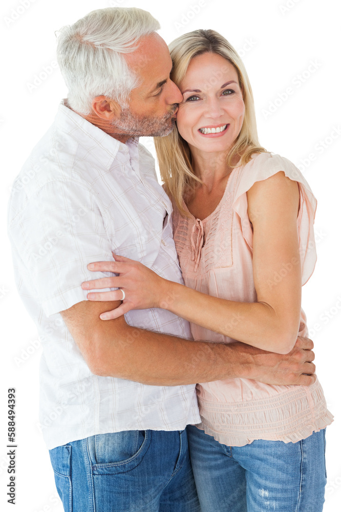 Affectionate man kissing his wife on the cheek Affectionate man kissing his wife on the cheek