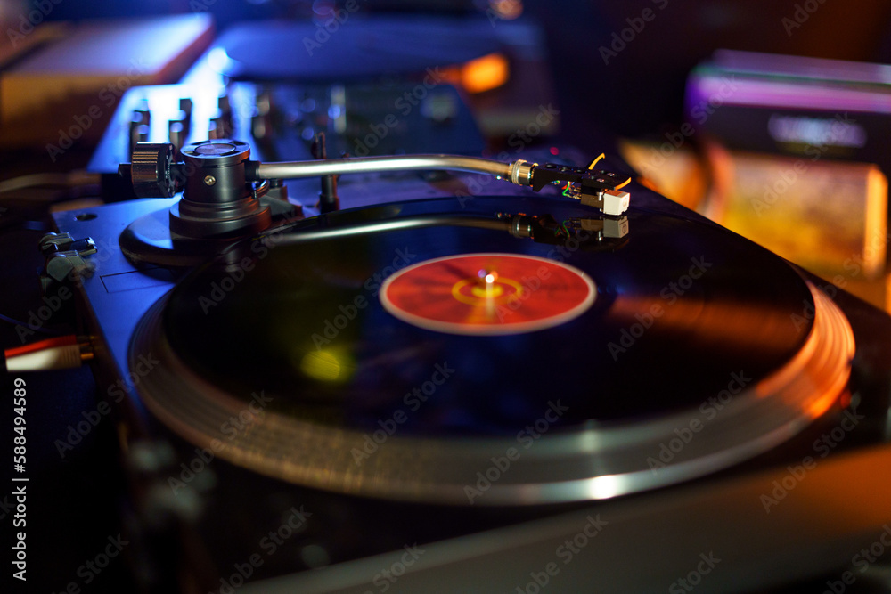 Vinyl record being played on a gramophone Vinyl record being played on a gramophone