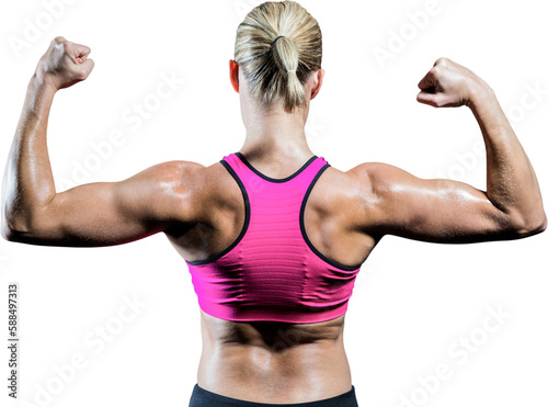 Muscular woman flexing her arms 