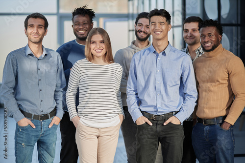 Successful business team smiling while standing in the office