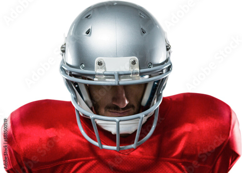 Close-up of serious American football player in red jersey looking down