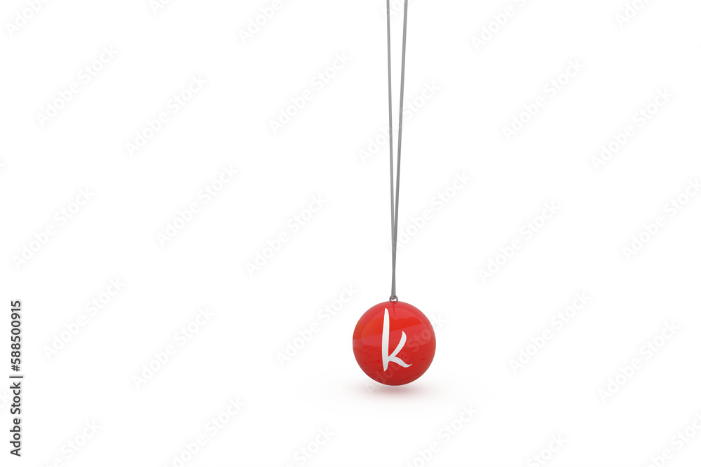 Digital composite image of red newtons cradle with alphabet k