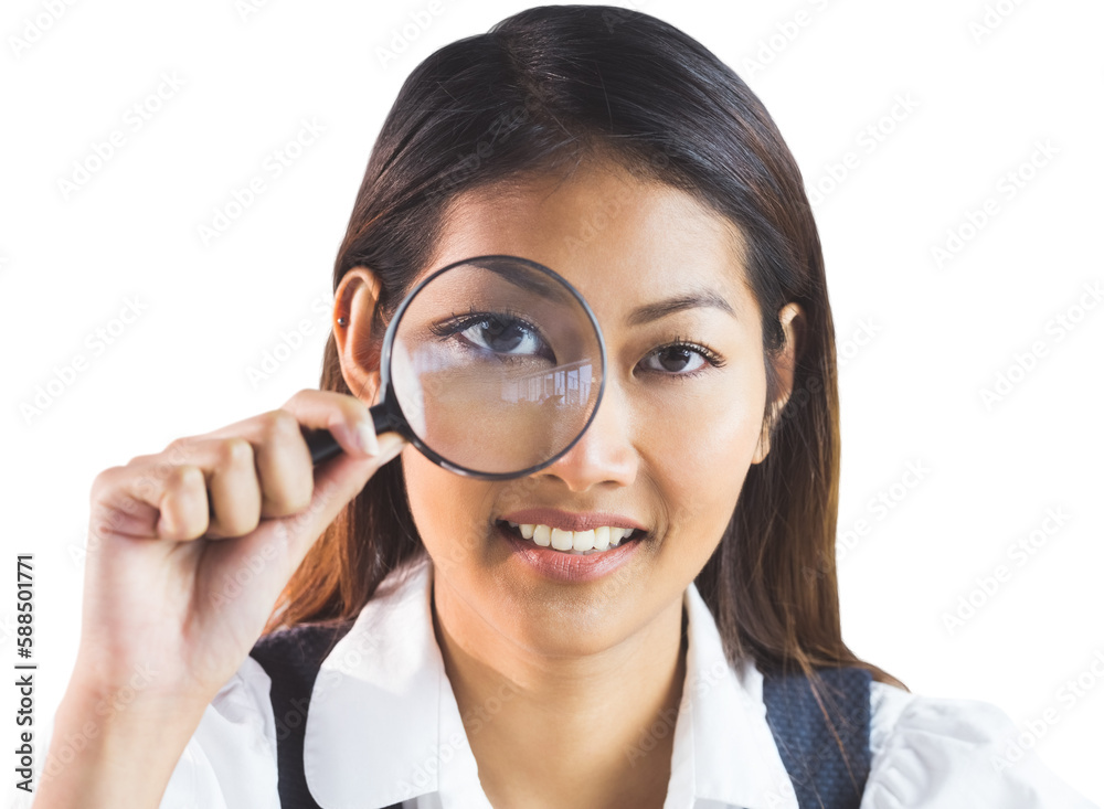 Businesswoman looking through magnifying glass Businesswoman looking through magnifying glass