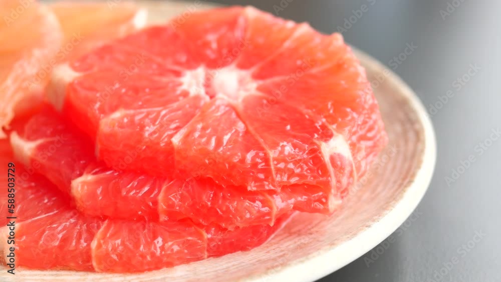 Fresh grapefruits on a plate Fresh grapefruits on a plate
