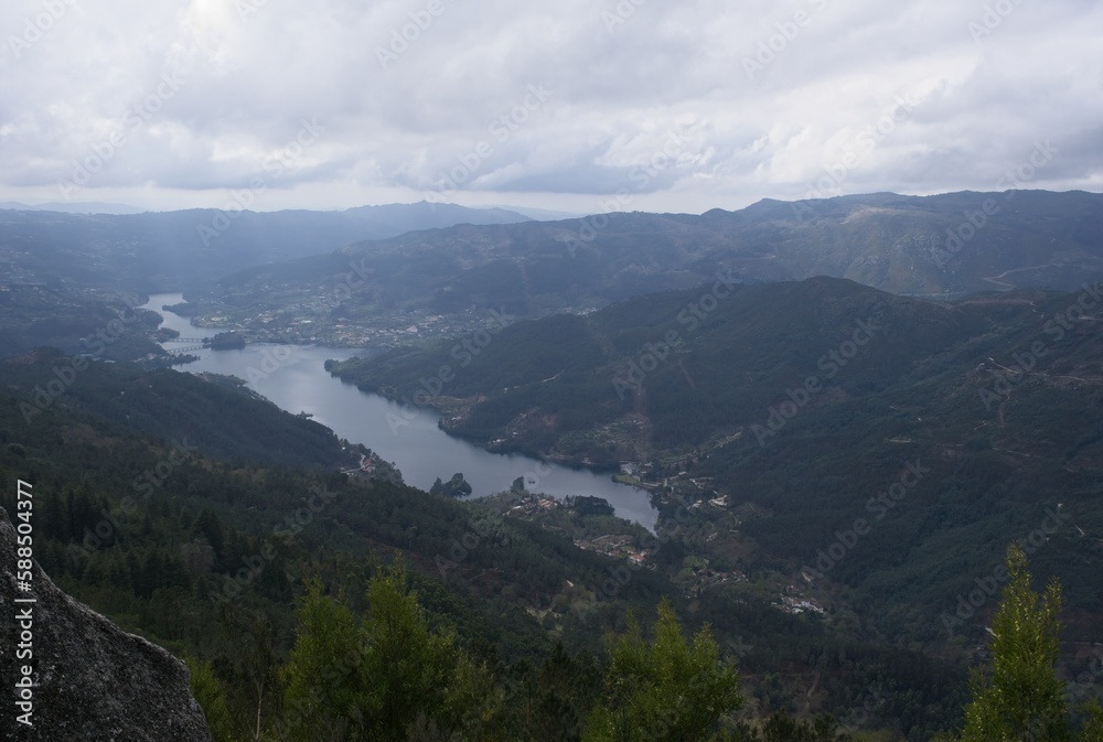 Wonderful landscapes in Portugal. Beautiful scenery from Viewpoint Rocas in Salamonde. Cavado lake. Cloudy spring day. Selective focus