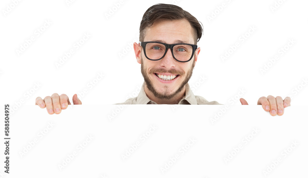 Geeky hipster showing poster smiling at camera Geeky hipster showing poster smiling at camera