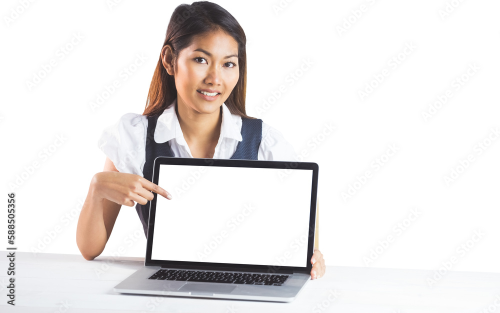 Smiling businesswoman pointing a laptop