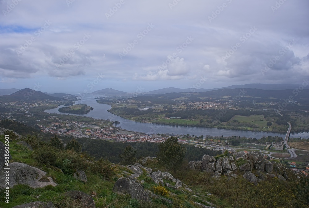 Wonderful landscapes in Portugal. Beautiful scenery of viewpoint Miradoiro do Cervo on river Mino in Lovelhe. Cloudy spring day. Selective focus