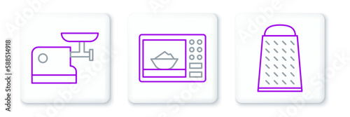 Set line Grater, Kitchen meat grinder and Microwave oven icon. Vector
