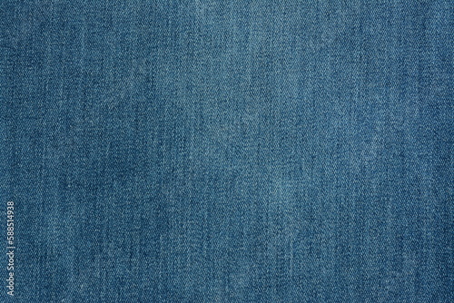 Blue cotton denim background. View from above