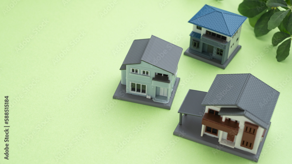 住宅模型と緑の背景