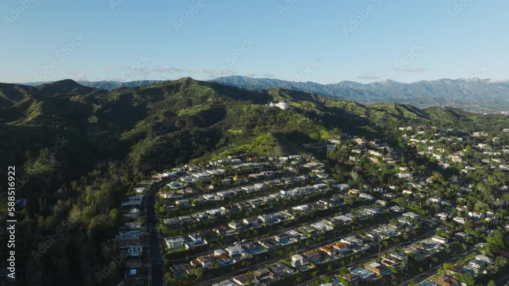 Drone aerial shot moving down on nice house with pool in Hollywood