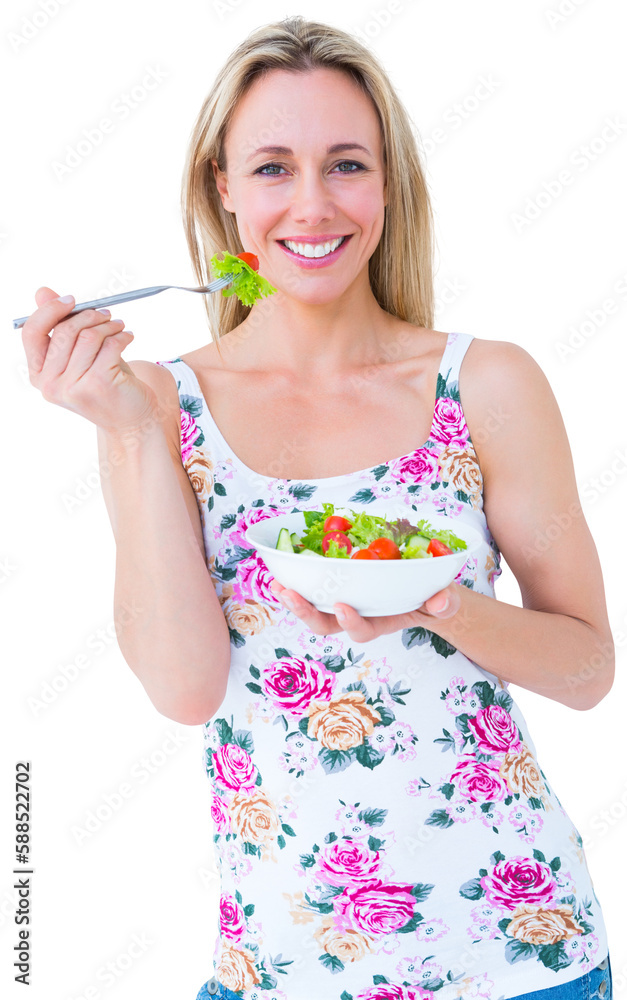 Pretty blonde eating bowl of salad Pretty blonde eating bowl of salad