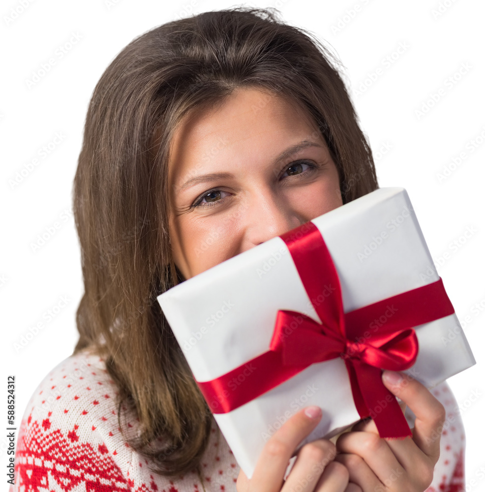 Smiling brunette holding a gift with red ribbon Smiling brunette holding a gift with red ribbon