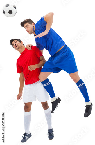 Football players jumping and tackling