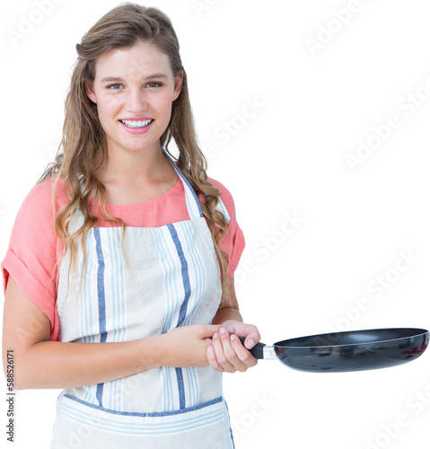 Happy hipster woman holding frying pan 