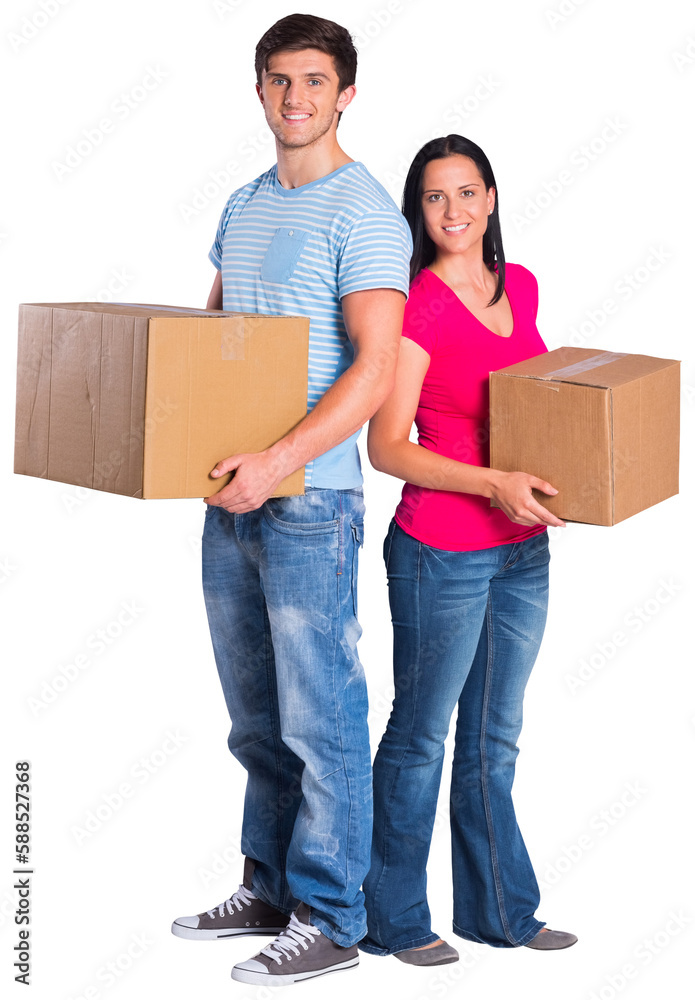 Young couple holding moving boxes Young couple holding moving boxes
