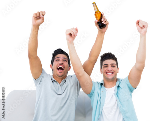 Sports fans celebrating while holding beer