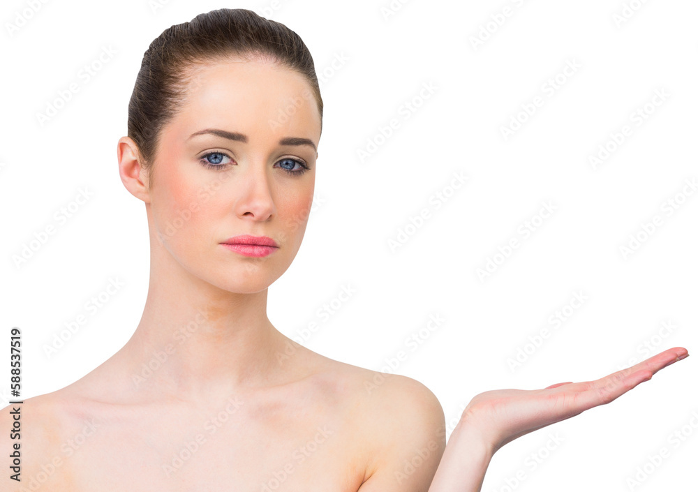 Fototapeta premium Beautiful brunette presenting with hand