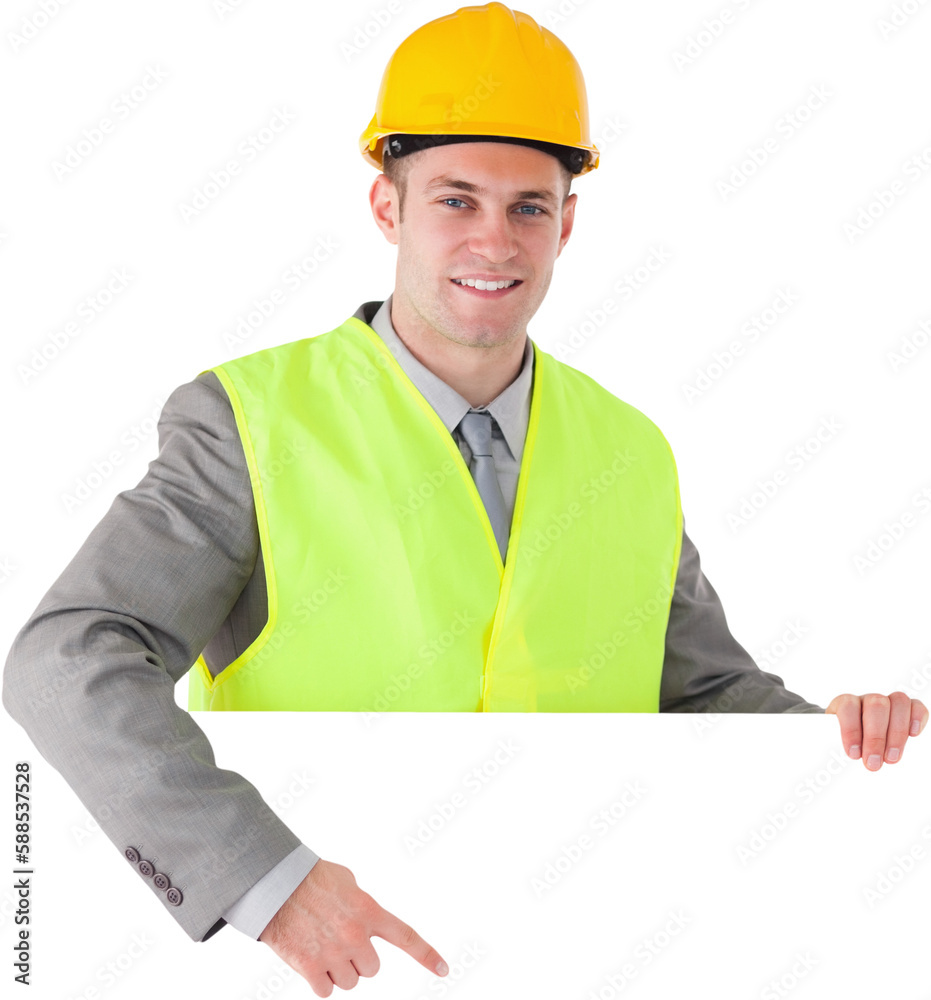 Smiling builder pointing at something