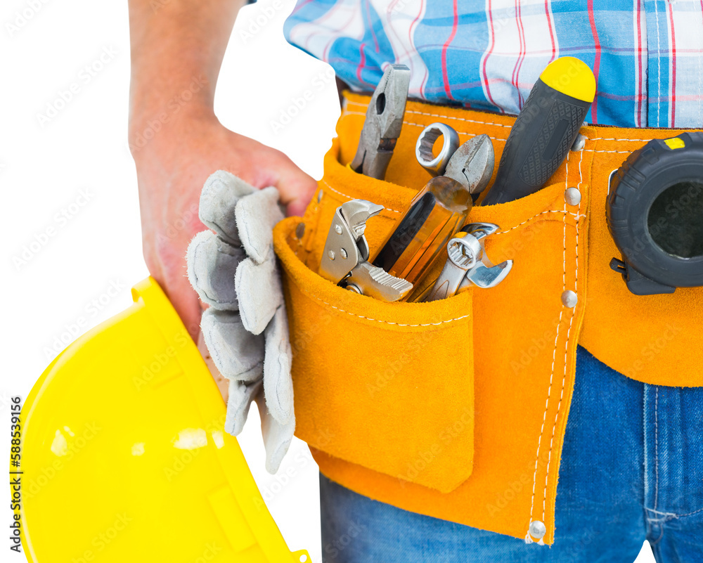 Manual worker wearing tool belt while holding gloves and helmet Manual worker wearing tool belt while holding gloves and helmet